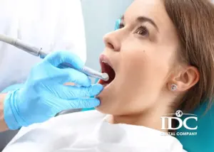 What is the difference between a dental crown and a veneer?