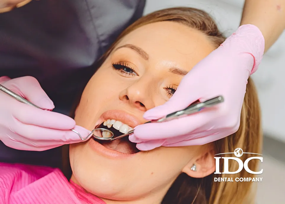 What is the difference between a dental crown and a veneer?