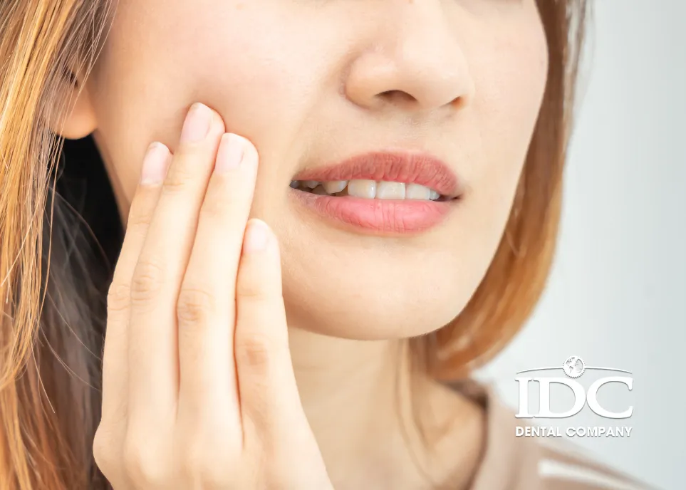 What causes tooth sensitivity after cleaning?
